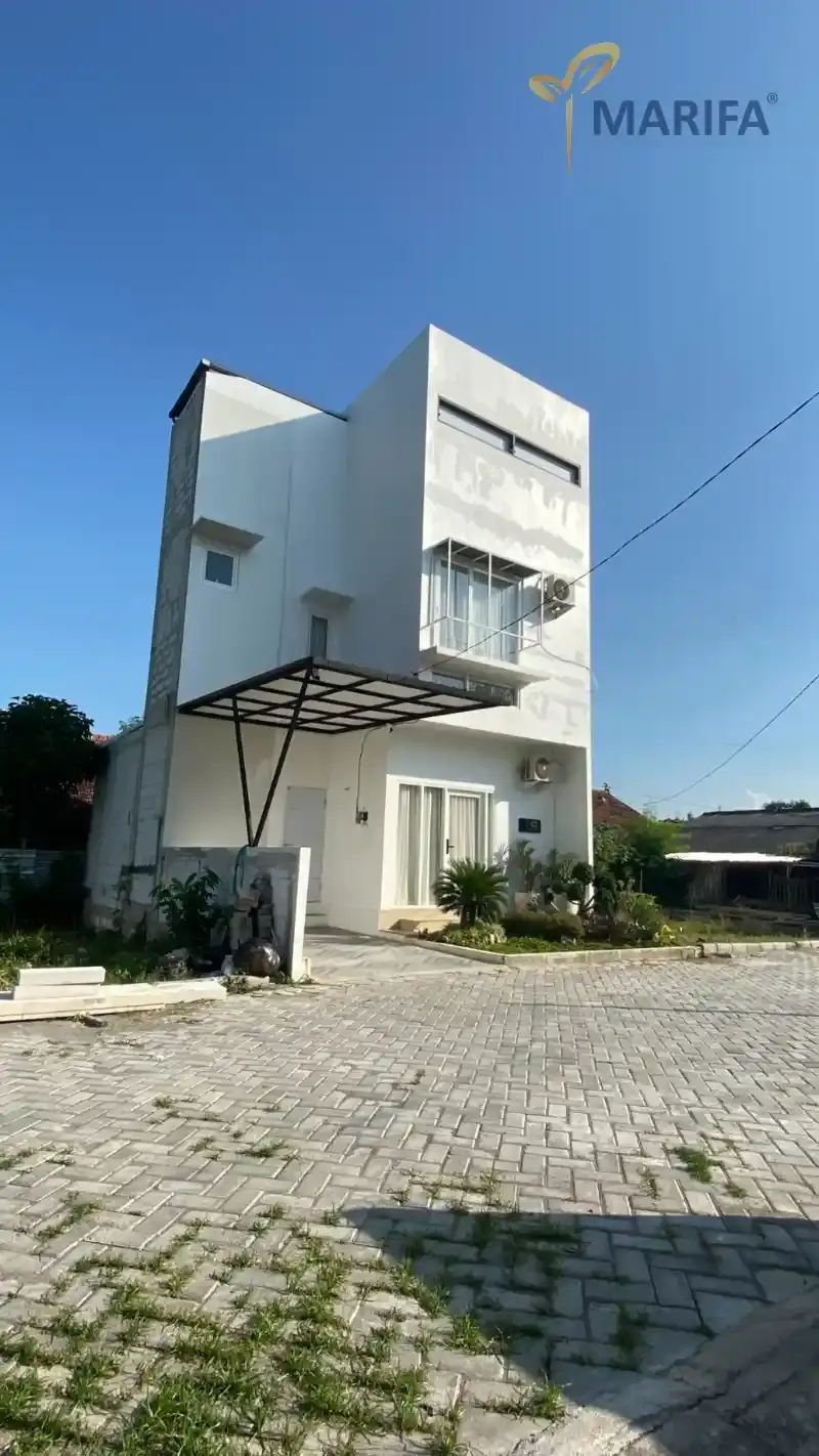 hasil akhir renovasi rumah dengan desain fasad modern