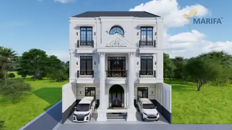 pekerja finishing sedang mengecat dinding rumah baru