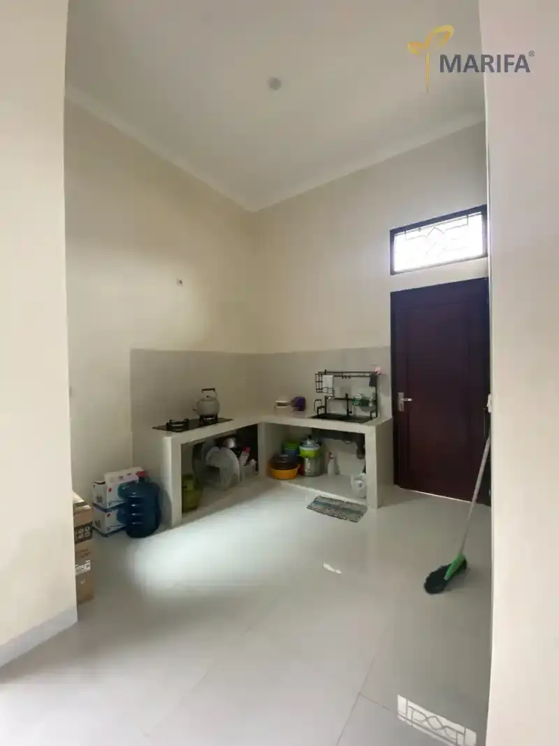 sesi konsultasi arsitek dan klien membahas denah rumah